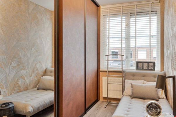 Een opgeruimde slaapkamer, een opgeruimd hoofd: zo pak je het aan